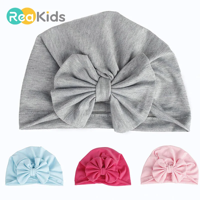 

REAKIDS Baby Children Hat Cotton Soft Turban Bow Children Kids Boy Girl New Design Cute Hat Child Newborn Cap For Baby Girl