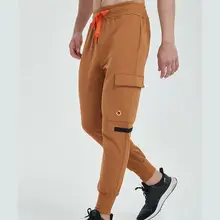 Для мужчин костюмы Штаны Мода Повседневное Sportwear Jogger лодыжки галстук карандаш Штаны Брюки Лоскутные карманы пот Штаны Для мужчин