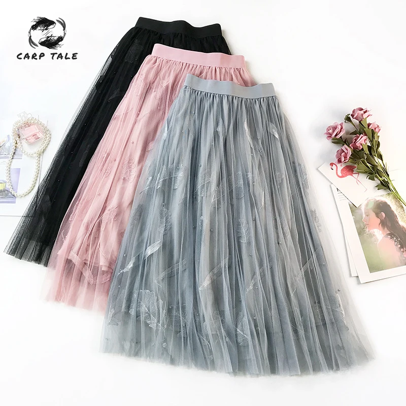 

2019 new feather embroidery beaded high waist solid color elastic A word skirt female long section fairy mesh beach party skirt