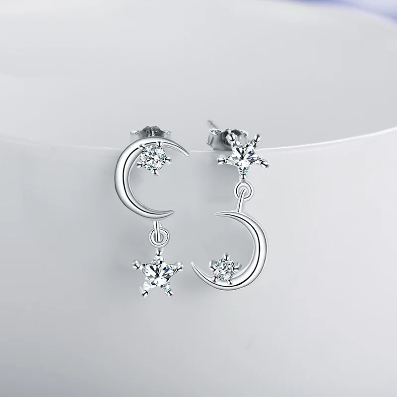 

Korean version of the asymmetric star moon earrings plated S925 silver hypoallergenic micro-inlay jewelry female earrings earrin
