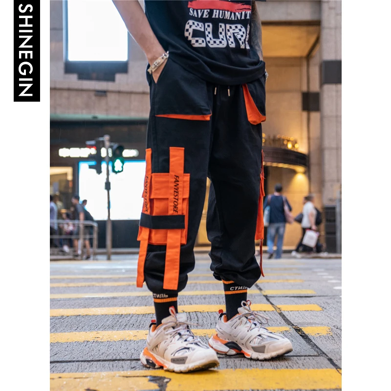 SHINEGIN Orange Multi pocket Cargo Pants Streetwear Tactical Pants Harem Pants Men Sweatpants Mens Casual Harem Joggers 262W SHINEGIN Orange Multi pocket Cargo Pants Streetwear Tactical Pants Harem Pants Men Sweatpants Mens Casual Harem Joggers 262W