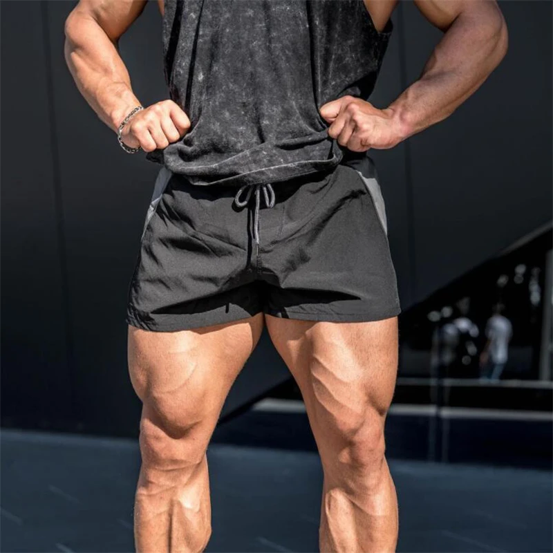 Pantalones cortos de Fitness para hombre pantalon de chandal informal a la moda para culturismo entrenamiento de marca gimnasio novedad de verano