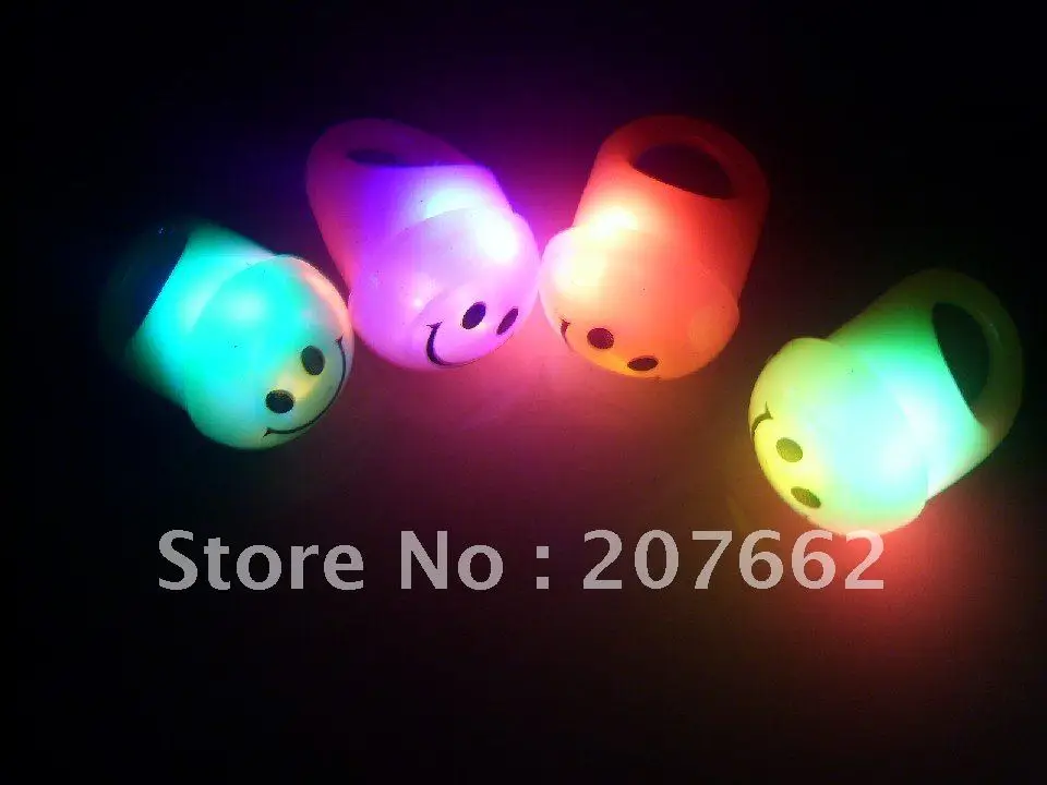 

Free Shipping 576pcs/lot soft gum LED flashing finger light smile face ring LED Rave Party Favors Glow Beams for Party