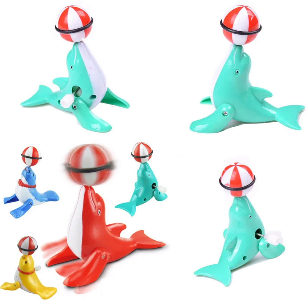 Мини-смешно Заводной пружины Дельфин вращать мяч для маленьких детей ветер игрушка для новорожденных банное красочная игрушка