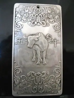 

Tibetan Silver Carving Chinese Zodiac Cow Statue Thangka Amulet 0.36lb