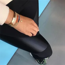 Стрейч мягкие Новая мода PU Лоскутная Леггинсы для женщин Для женщин спортивные Леггинсы для женщин Фитнес Брюки для девочек для отдыха Мотобрюки