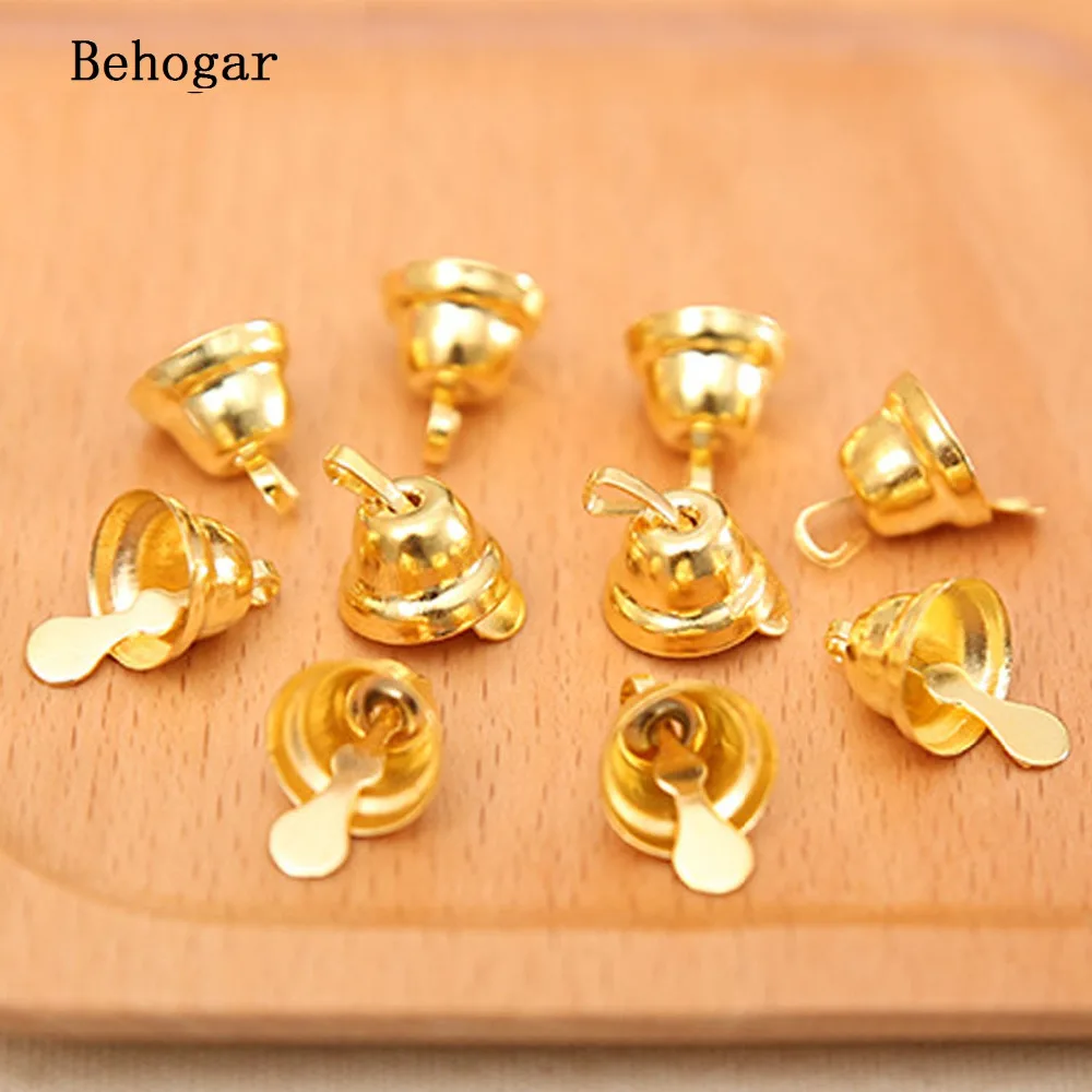 

Behogar 100PCS 11MM Xmas Mini Gold Jingle Bells Ornaments Decorations for Home Christmas Tree Decorative Flag Craft navidad