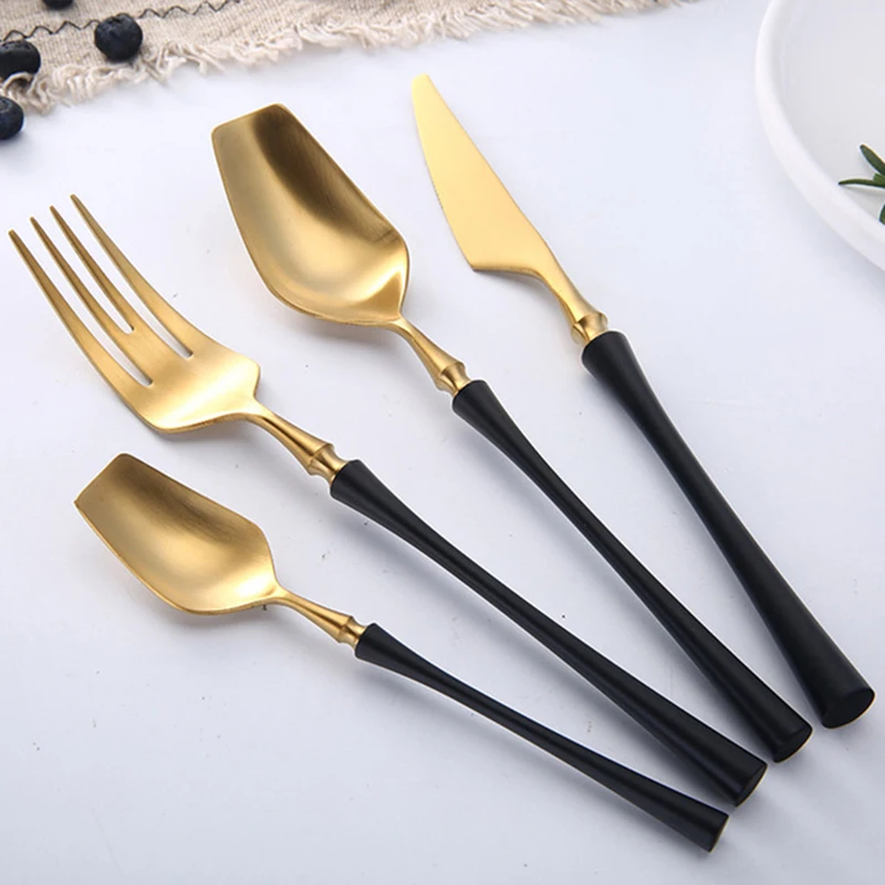 gold and silver flatware set