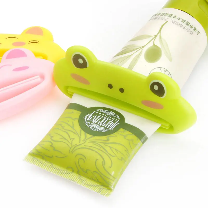 2pcs/lot Cartoon Tube Rolling Squeezer Clip Tube Squeezer Toothpaste Dispenser Vacuum Sucker Hook Dispenser Squeeze Tools