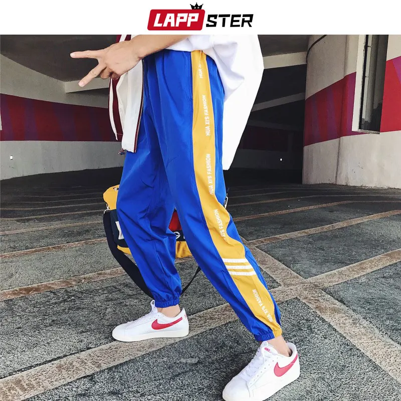 LAPPSTER الرجال الشارع الشهير ركض السراويل 2019 رجل المتناثرة الهيب هوب Sweartpants الذكور الجانب مخطط ركض الربيع الأبيض السراويل الترنك