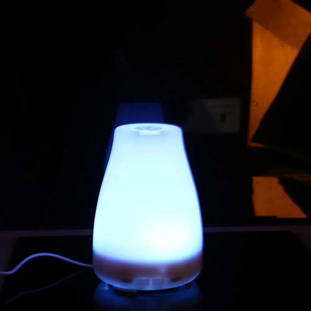 

Aroma Diffuser Ultrasonic Air Aroma Humidifier With 7 Color LED Lights Electric Aromatherapy Essential Oil Aroma Diffuser