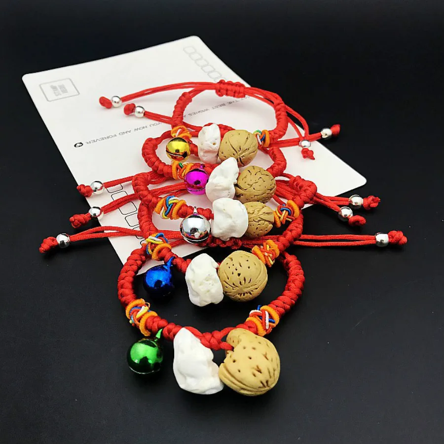 

Fashion The Dog Tooth Peach Pit Beads Bracelets The Bell Red Rope Good Luck Hand Catenary 2019