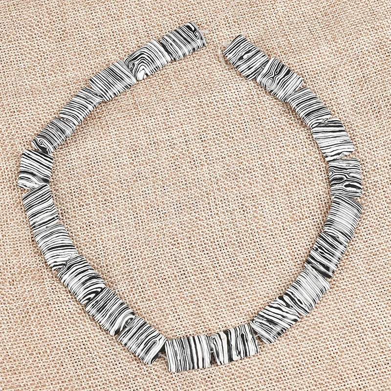 

Long bar of regular order and Zebra - striped with black and white 18*13*5 MM Syn-thetic Zebra stone Loose beads