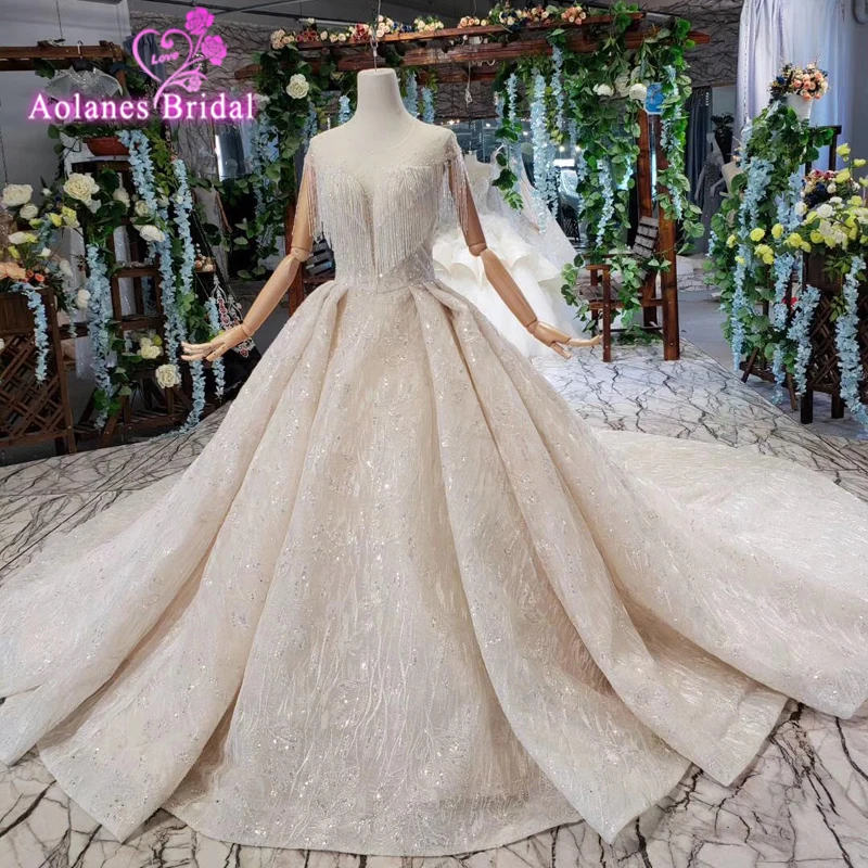 

Tassel O Neck Lace Appliques Ball Gown Luxurious Bling Bling Wedding Dresses Short Sleeves Bridal Dresses Glitters Wedding Gowns