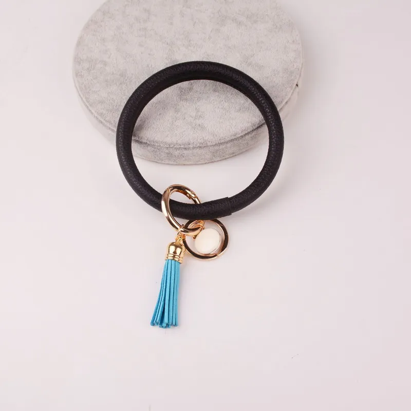 Новая мода ретро большой кожаный наручное украшение кольцо для ключей из сплава кулон Флокирование кисточкой брелок для ключей в стиле унисекс ювелирные изделия Bijoux поводок пряжка