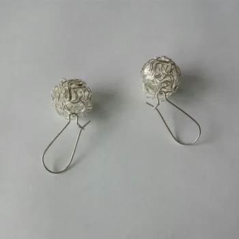 

Hot fashion earrings jewelry ornaments hollow silver ball ball earrings female jewelry wholesale