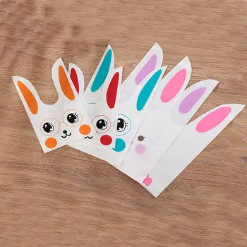 

Hot 50pcs 10cmx17cm 14 Patterns Rabbit Ears Plastic Bag Wedding/Birthday/Gifts Packaging Bag Cookies Chocolate Bag Jewelry Bags
