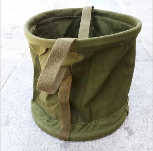 

Surplus Vietnam War military PORTABLE CANVAS WATER BUCKET OUTDOOR FISHING PAIL - World military Store