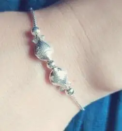 

Free shipping S999 pure silver bracelet hand chain true 999 silver two kiss fish in this bracelet