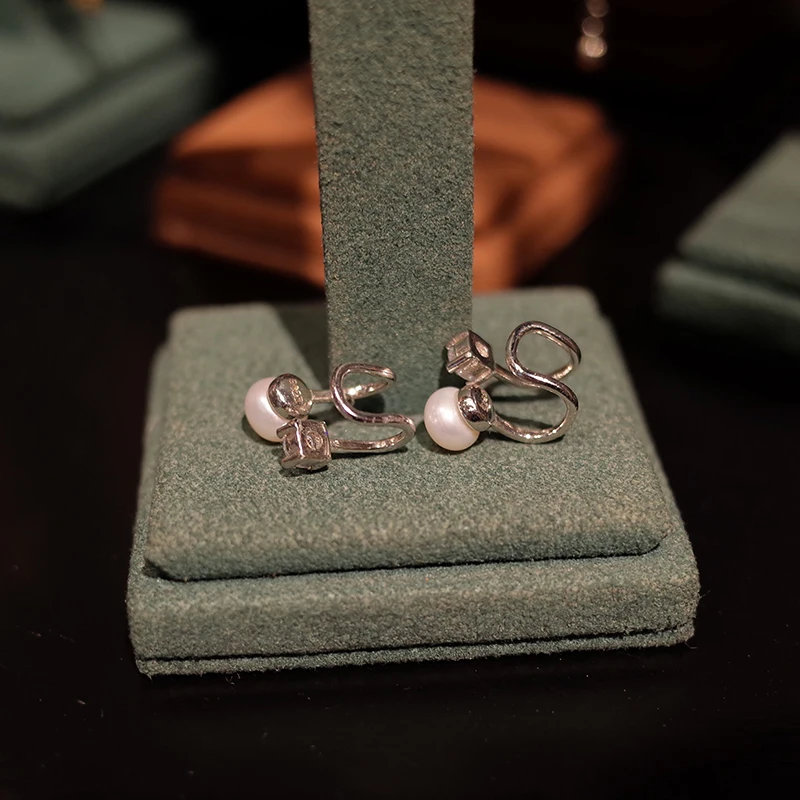 

Local focal geometric design Simulated-pearl Clip Earrings