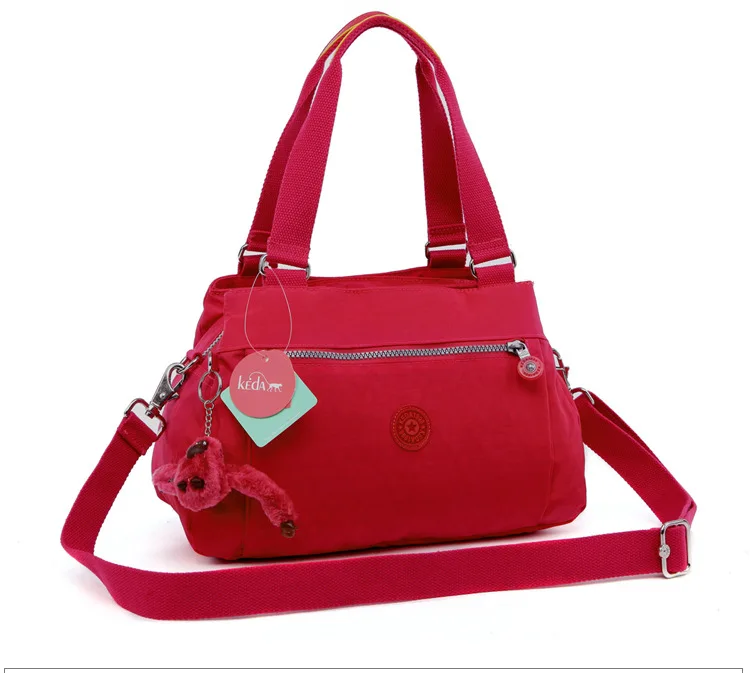 

KEDANISON BRAND WOMEN HANDBAGS with monkey keychain