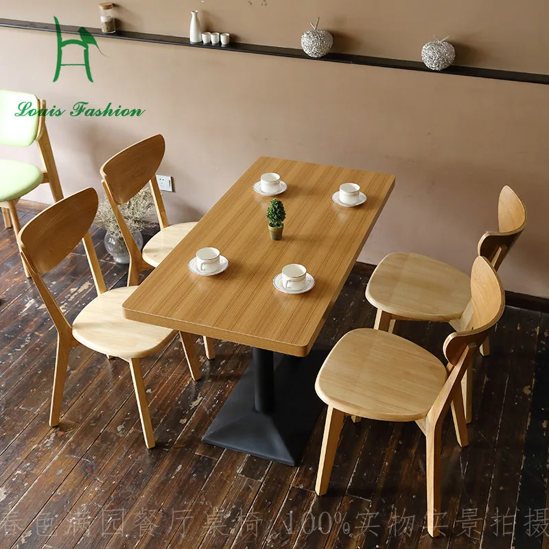 

Louis Fashion Solid Wood Dinning Table and Chair Set Simple European Style