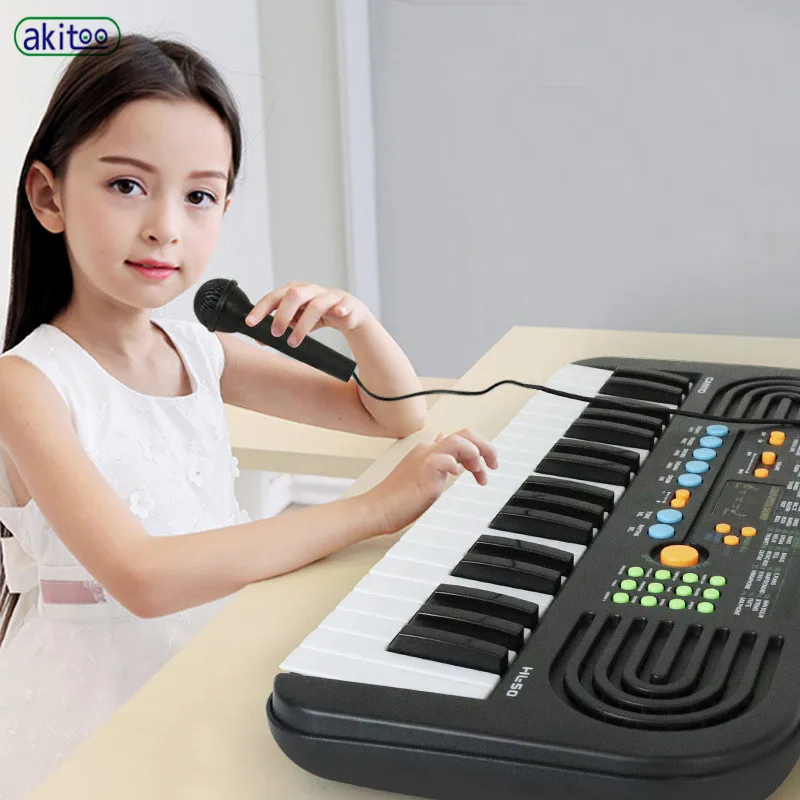 

akitoo Children's musical toy 37 key High quality black and white key electronic keyboard dual power mode with microphone #402