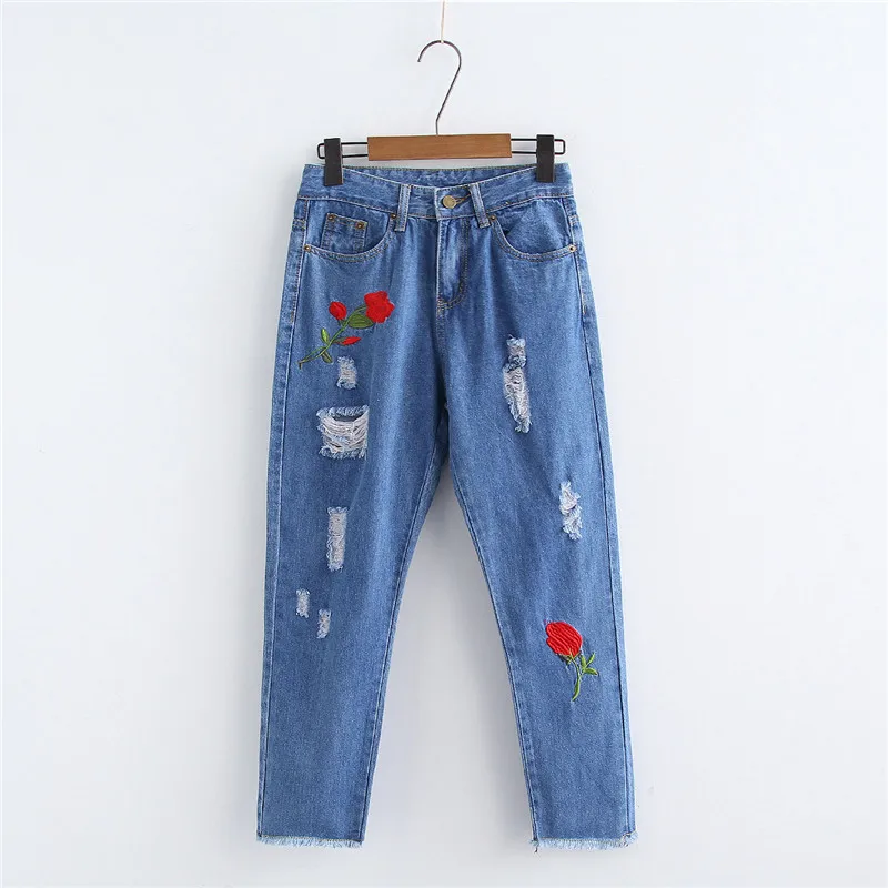 

The New Spring And Summer European Style Leisure All-match Embroidered Hole Jeans Women Slim Pencil Pants Female Feet