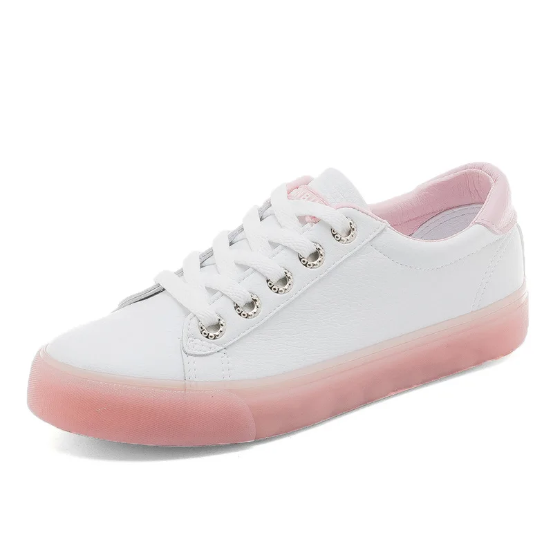 white sneakers with pink soles
