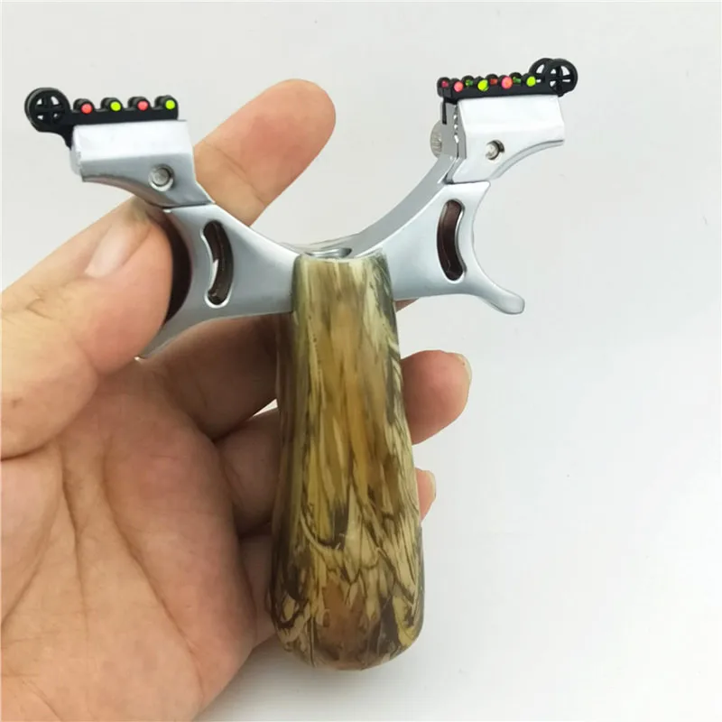 

1pcs Powerful Steel Alloy Slingshot Sling Shot Catapult Camouflage Bow Catapult Outdoor Hunting Camping Bow Travel Kits