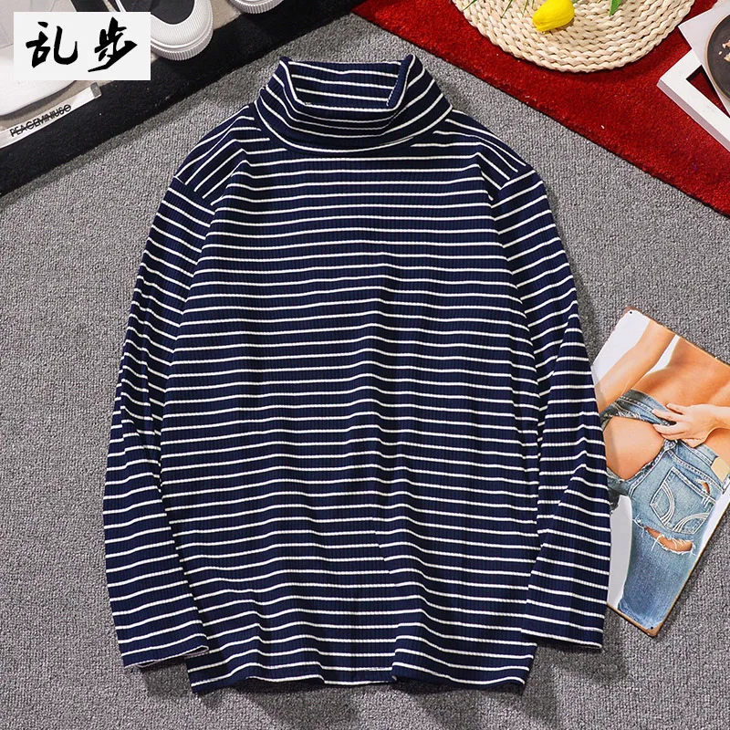 

Black-and-white striped T-shirt with long sleeves