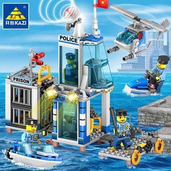 

312pcs KAZI Building Blocks 4 IN 1 city Police Station on sea helicopter/boat/prison DIY Construction Bricks Toys for children