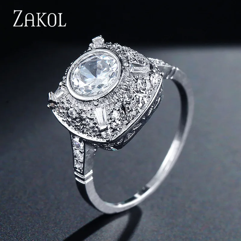 

ZAKOL Exquisite Round Cz Zircon Micro Pave Finger Ring for Women Fashion Elegant Bridal Wedding Party Jewelry Anneaux FSRP2053
