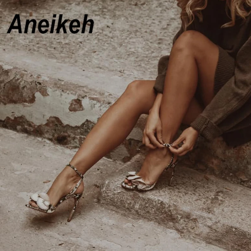 

Aneikeh 2019 New Fashion Sexy Butterfly-knot Buckle Thin High Heels Black Faux Suede Open Toe Gladiator Dress Sandals Lady Shoes