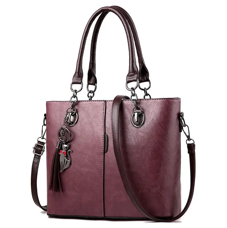 Yogodlns, зимние женские кожаные сумки хитового цвета, повседневные сумки-тоут, сумка через плечо, Сумка с верхней ручкой, с кисточкой и подвеской в виде кошки - Цвет: Dark purple