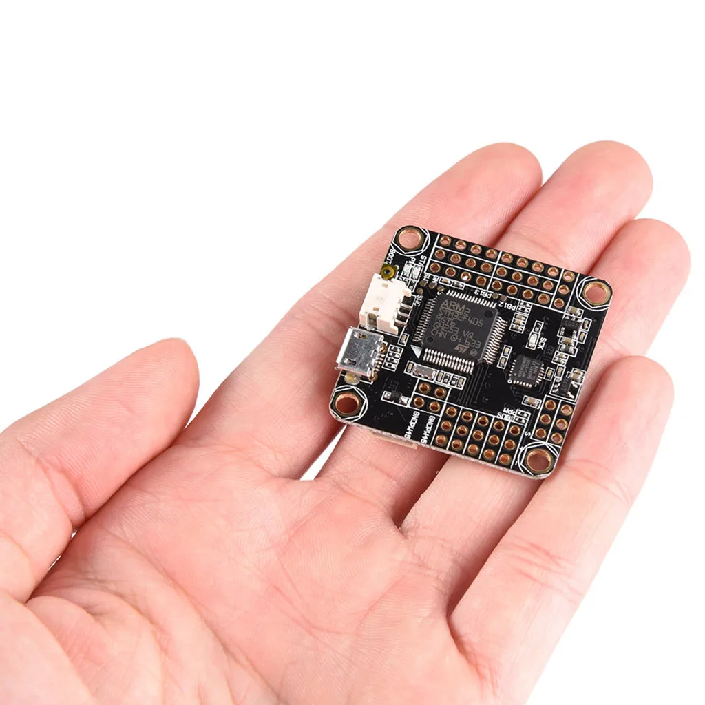

Betaflight OMNIBUS F4 Flight Controller STM32 F405 MCU Integrated OSD SPI Sensor MPU6000 RC Toys Part 128Mbit Flash 6PWM Output
