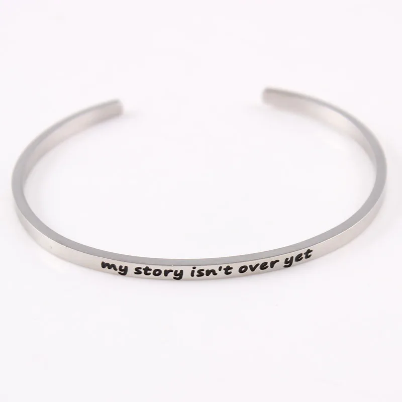 

Mantra Bracelet My Story Isn't Over Yet Silver Tone Cuff Bracelet Suicide Self Harm Awareness Stainless Steel Engraved Bangle