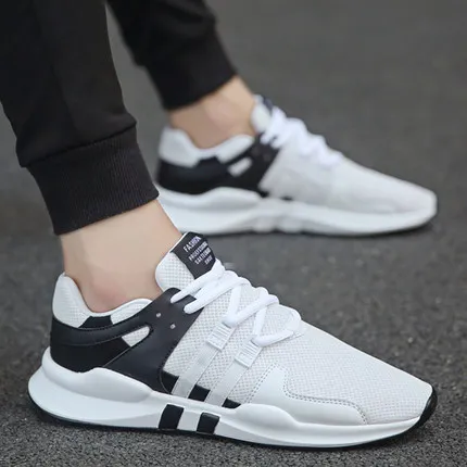 Baratos Zapatos de lona informales deportivos de verano para hombre versión coreana de la tendencia de los zapatos de tela.