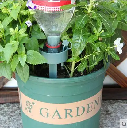 

Free shipping,2pcs/lot,Automatic watering device,sprinklers Coke bottle water seepage control automatic drip applicable,garden
