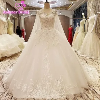 

Gorgeous A Line Wedding Dresses 2017 Puffy Lace Beaded Appliques Sequins Sleeveless Wedding Gowns robe de mariage With Shawl