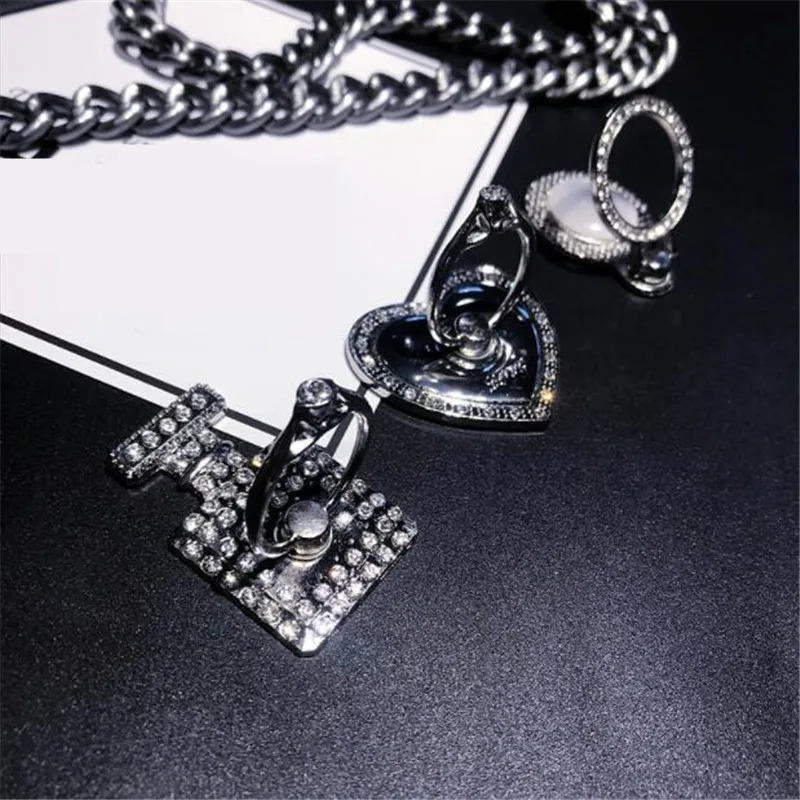 

UVR Round Metal Diamond Crystal Finger Ring Smartphone Stand Holder Mobile Phone Holder Stand For iPhone Ring All Smart Phone
