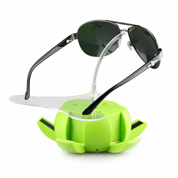 

Solar Auto Rotating Display Stand Rotary Turn Table Plate For mobile MP4 Watch jewelry VIP Store