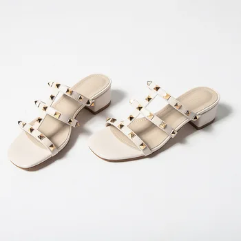 

2019 summer new style simple and simple solid color rivet decorated high-heeled slippers women comfortable Roman style slippers