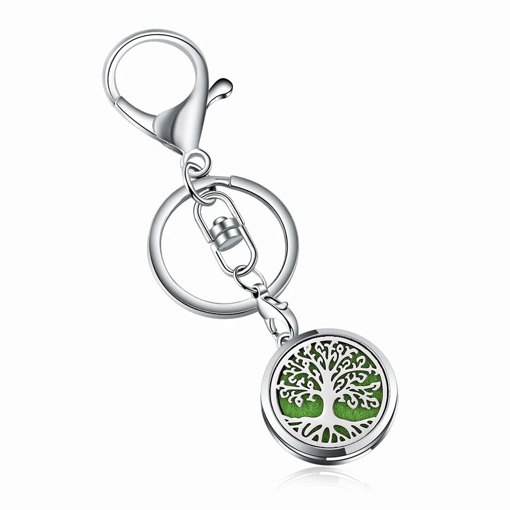 

Fahsion Clover Life Tree Love mom pattern Hollow Aromatherapy Perfume Locket Keychain Hook floating locket key chain wholesale