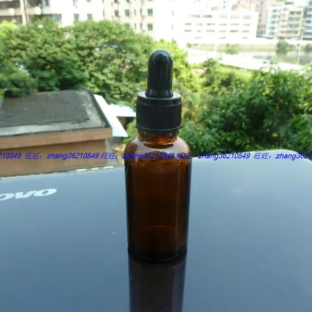 Download 30ml brown/amber Glass Essential Oil Bottle With black plastic normal dropper cap. Oil vial ...