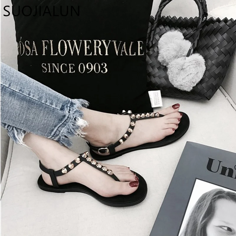 

SUOJIALUN 2019 New Beach Flip Flops Sandals Summer Flat Sandals Women Casual Rivet Solid Buckle Strap Plastic Jelly Shoes