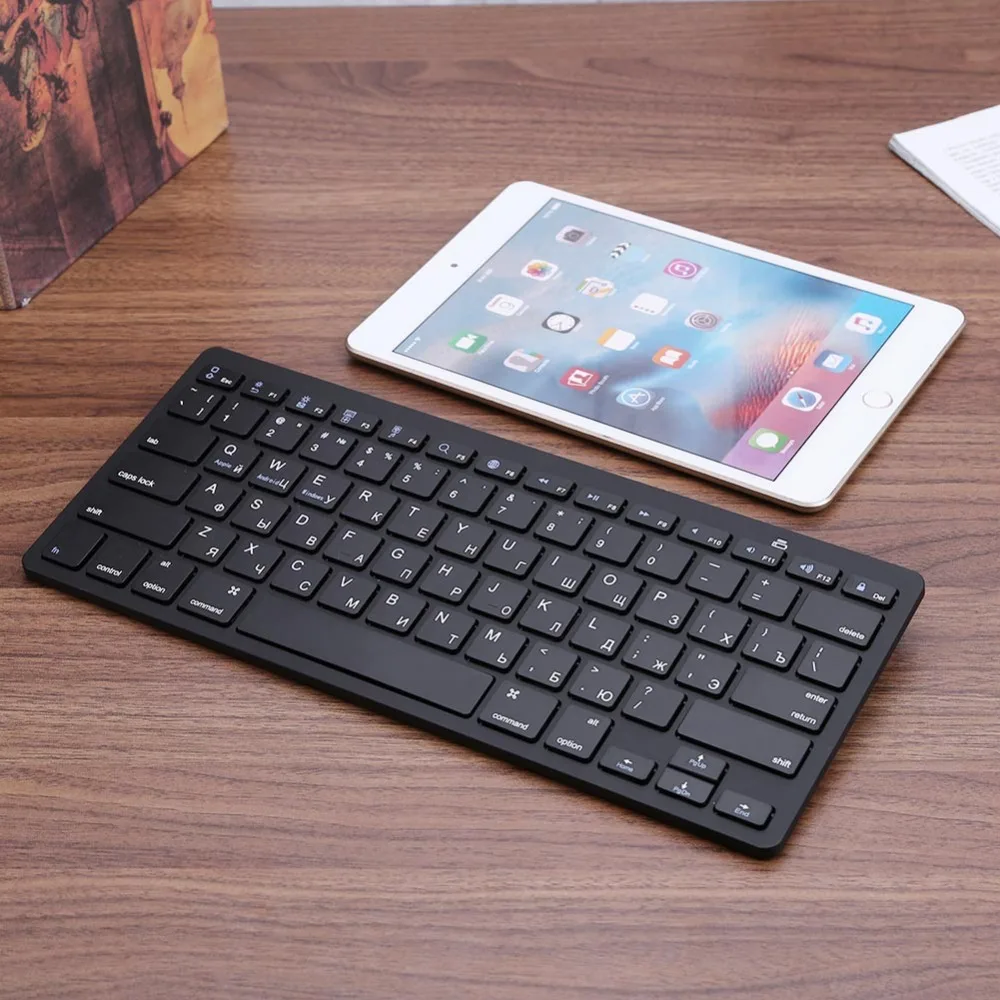 

Russian/English Wireless Bluetooth3.0 2.4 GHz Mini Slim keyboard for Tablet Laptop Smartphone Support iOS Windows Android System