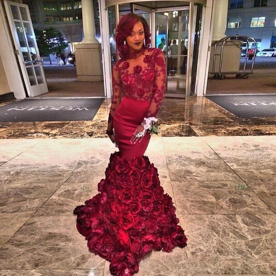 red prom dress with roses at the bottom