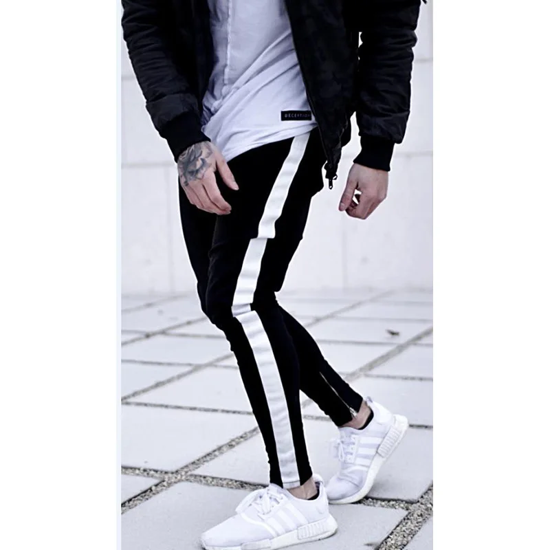 

2019 Black jeans men so elastic Zipper hole Bandage design jeans Man pants Slim fit cotton Denim harem pants Man