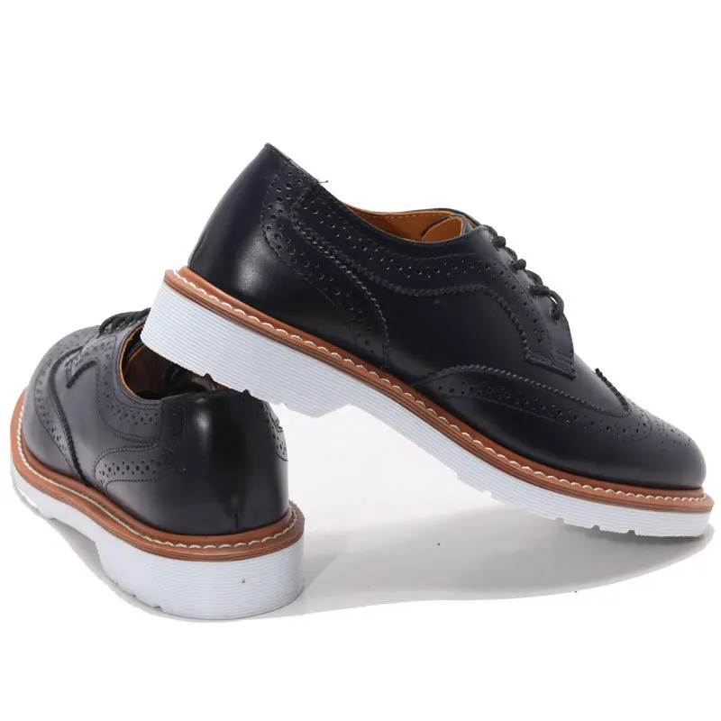 leather shoes with white soles